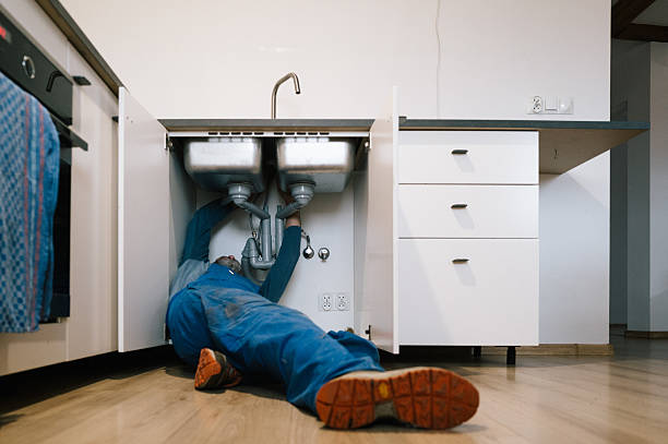 Professional Drain Cleaning technician working in Oyster, VA